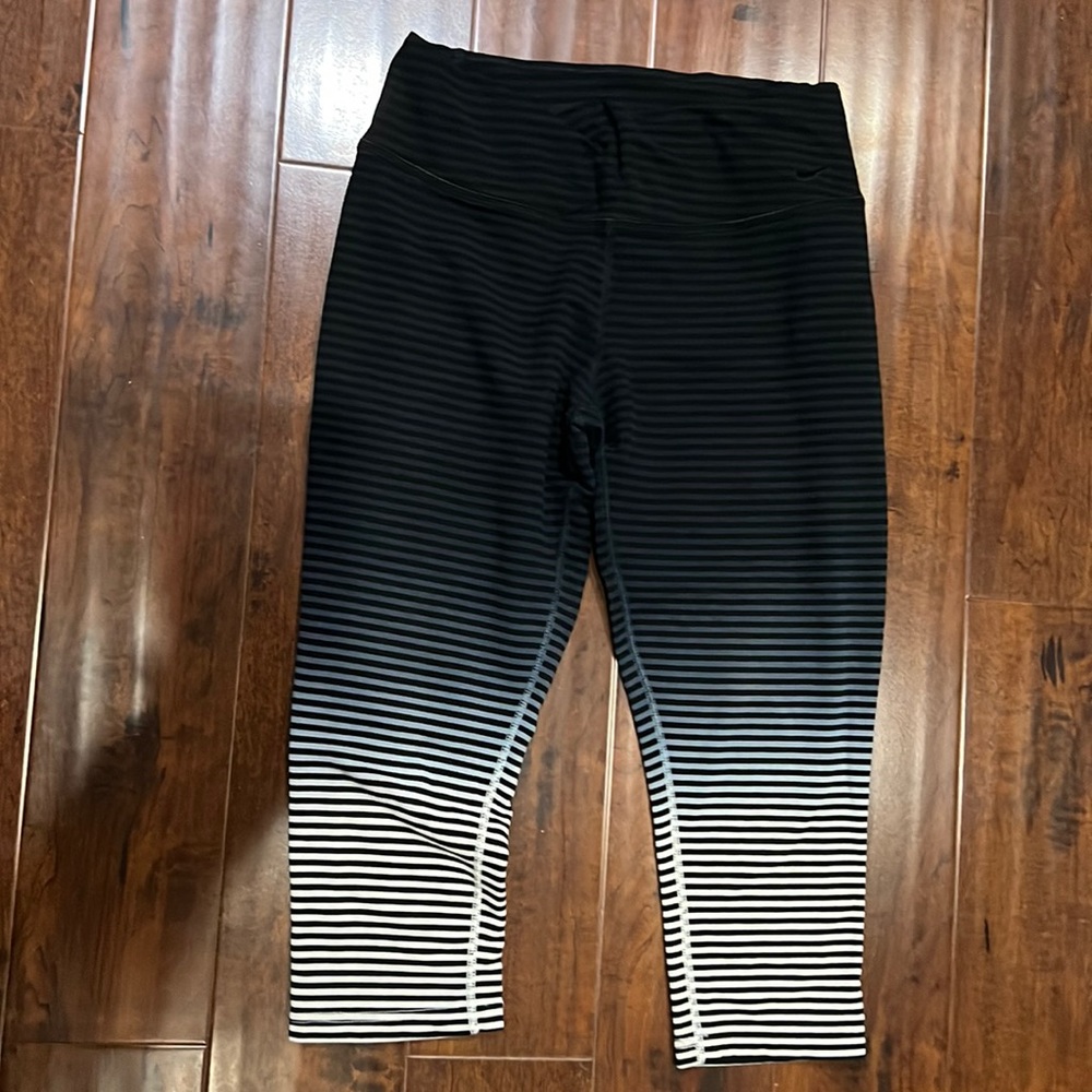 Nike workout pants that are stripped colored